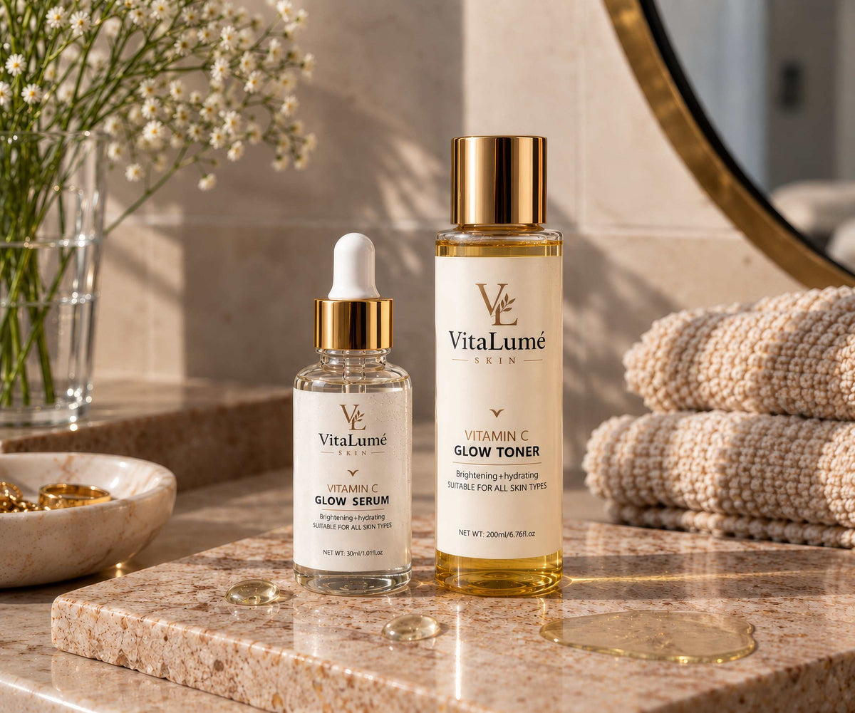 Skin Brightening Serum with two clear VitaLumé skincare bottles, gold caps, and cream labels featuring Vitamin C serum and toner