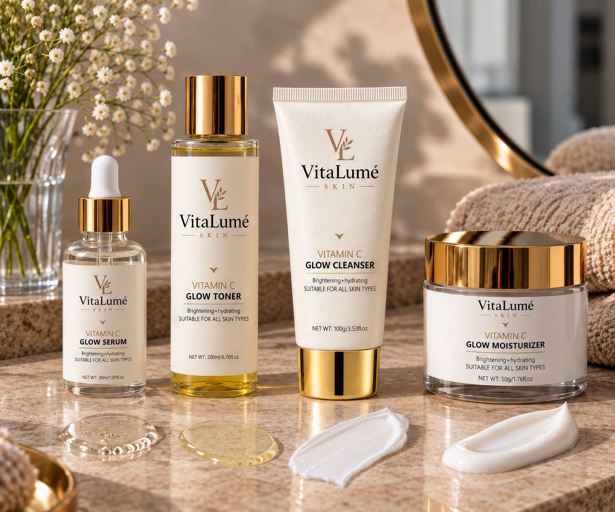 glowing skin care with clear and white VitaLumé Vitamin C skincare bottles, gold caps, and clean minimalist labels